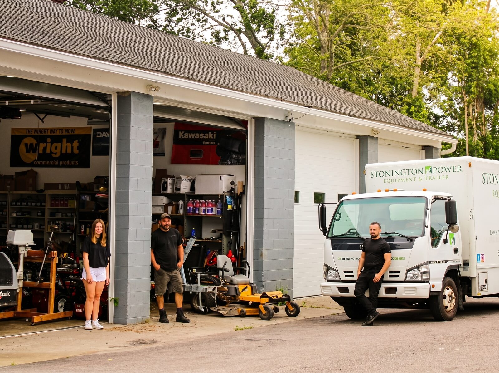 The Stonington Power family out front of the Ashaway shop